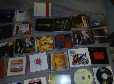 Collection of 58 assorted music CDs