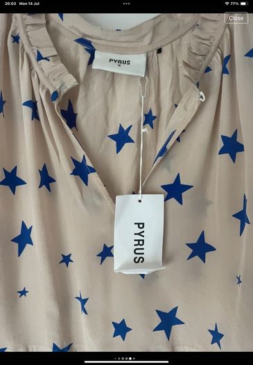 top bnwt 100% silk peplum top Pyrus brand cream with blue star pattern small