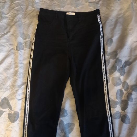 Black stretchy jeans with white stripes, size S, like new