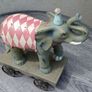 Beautiful Elephant on Metal Wheels Image 2