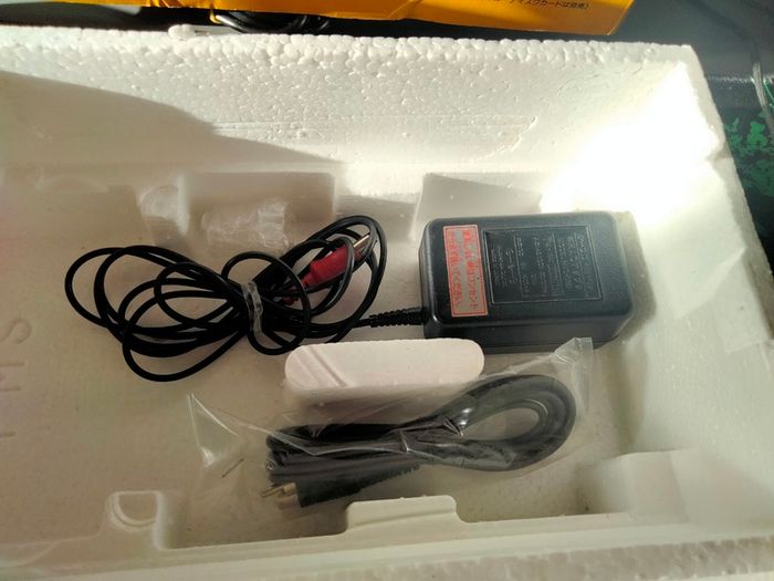 Boxed Famicom Disk System + games