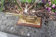 old brass and mahogany tobacco cutter