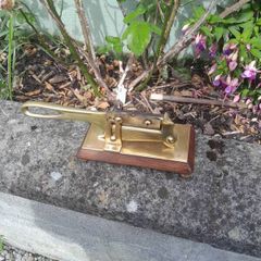 old brass and mahogany tobacco cutter