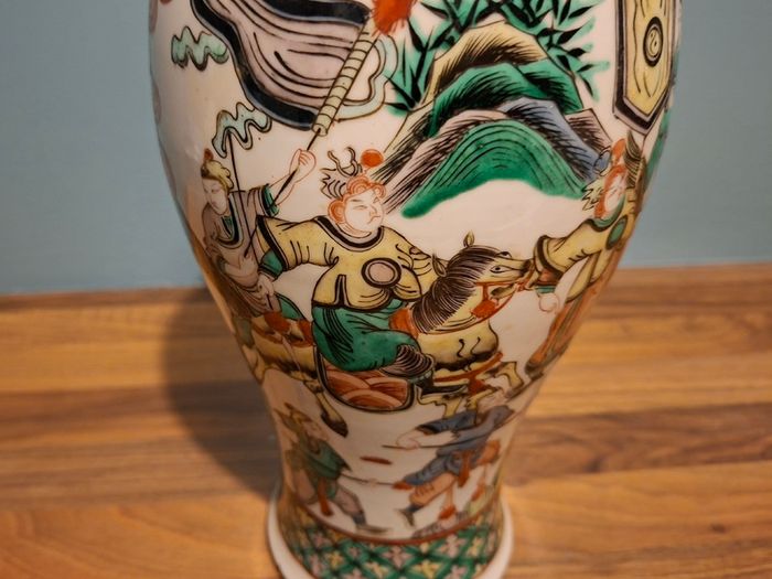 A late 19th century Chinese large famille verte vase, decorated with Chinese figures 32cm