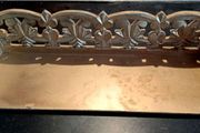 Carved wooden shelf