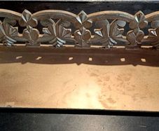 Carved wooden shelf