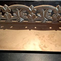 Carved wooden shelf
