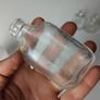 311 - Set of 4 Vintage Decorative Collectible Clear Glass Bottles Image 5