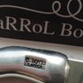 A collectible knife made of polished pewter with a stainless steel blade from Carrol Boyes. Image 6