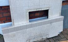 1930s tiled fireplace surround and hearth