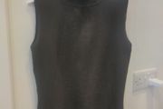 Ladies sleeveless polo neck top