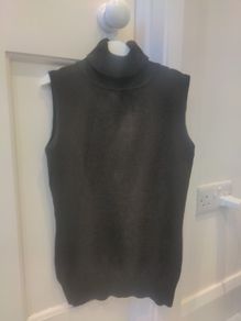 Ladies sleeveless polo neck top