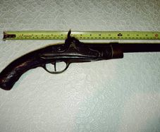 old percussion pistol for decor only