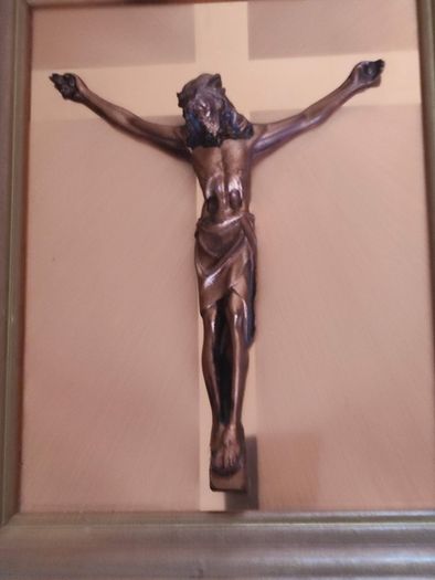 Framed copper crucifix - the copper figure of Christ, set against a copper mount,