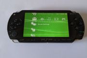 PSP original console with charger and battery