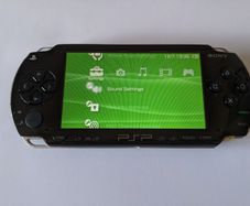 PSP original console with charger and battery