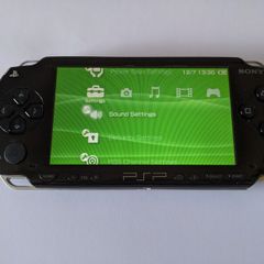 PSP original console with charger and battery