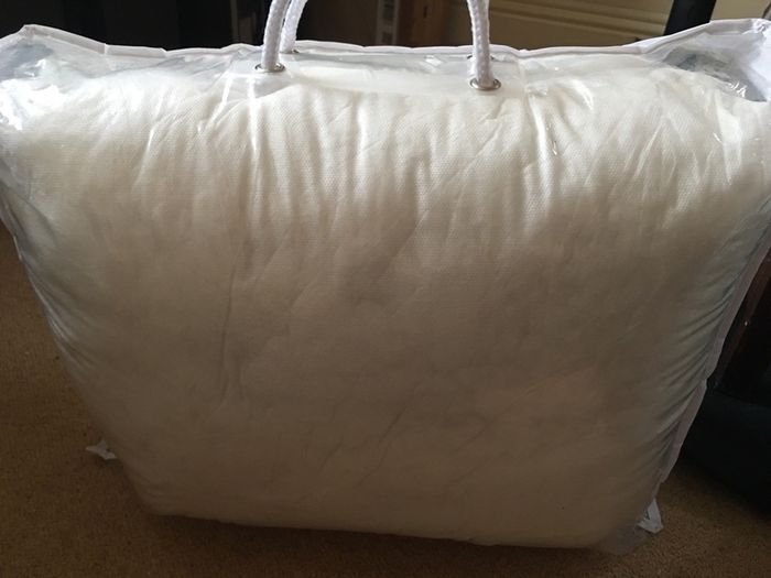 pregnancy pillow with its cover