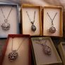 selection of homemade white metal necklaces Image 5