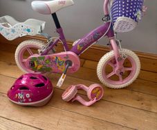 stairgate , high chair , girls bike with stabilisers and helmet