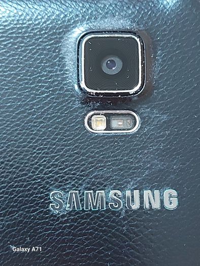 Samsung Galaxy Note 4, Model SM-N910F, in excellent cosmetic condition, not powering on, Battery looks a little swollen, so may need new battery