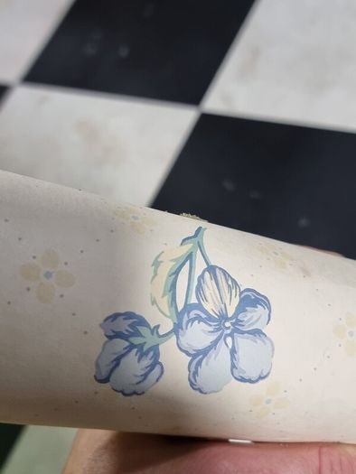 Roll of floral wallpaper