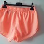 Orange shorts new Fits size xs s small m Image 4
