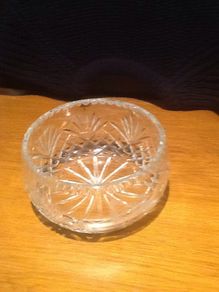 Crystal bowl with golfer engraved on side.