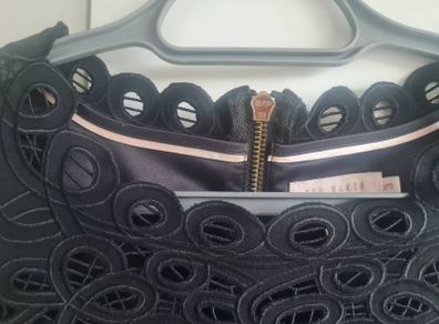 Ted Baker , Adriana Papell