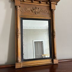 Small decorative gilt antique mirror