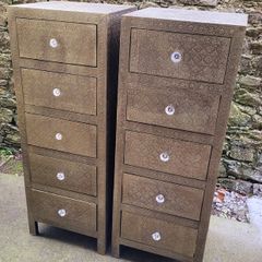 Embossed brass pair of tallboys