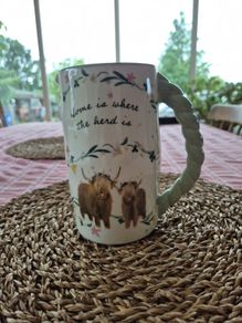 Novelty Jug : 'Home is where tge herd is'.