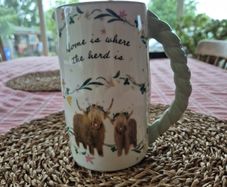 Novelty Jug : 'Home is where tge herd is'.
