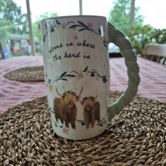 Novelty Jug : 'Home is where tge herd is'.