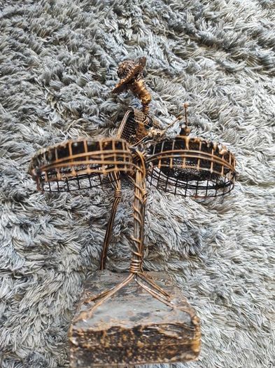John Flavius and Alfred Weekes wire statue ornament