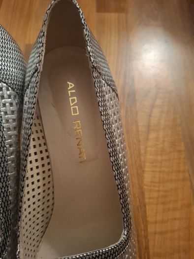 Silver low heeled pumps