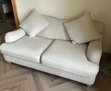 2 seater cream sofa