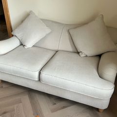 2 seater cream sofa