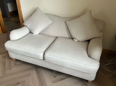 2 seater cream sofa