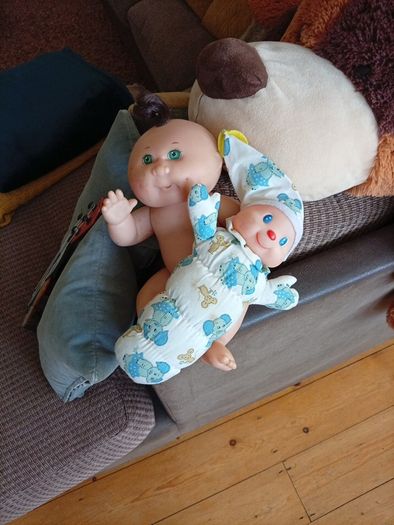 Cabbage patch doll and glo worm doll