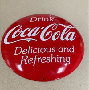 Coca Cola embossed metal sign