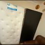 Single bed frame with headboard and mattress. Image 2