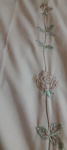 A pair of vintage embroidered curtains