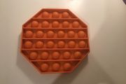 Orange hexagon pop it