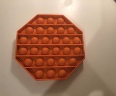 Orange hexagon pop it