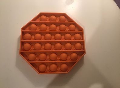 Orange hexagon pop it