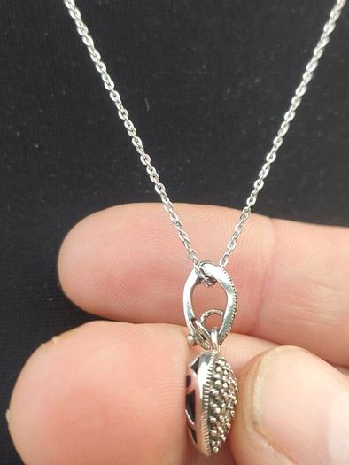 New and boxed Sterling Silver Swarovski Marcasite pendant set