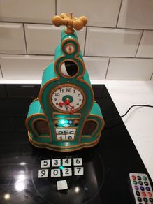 Grinch themed clock with radio and Bluetooth
