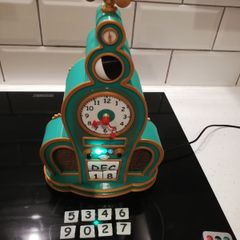 Grinch themed clock with radio and Bluetooth