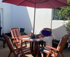 Hard wood garden table and chairs